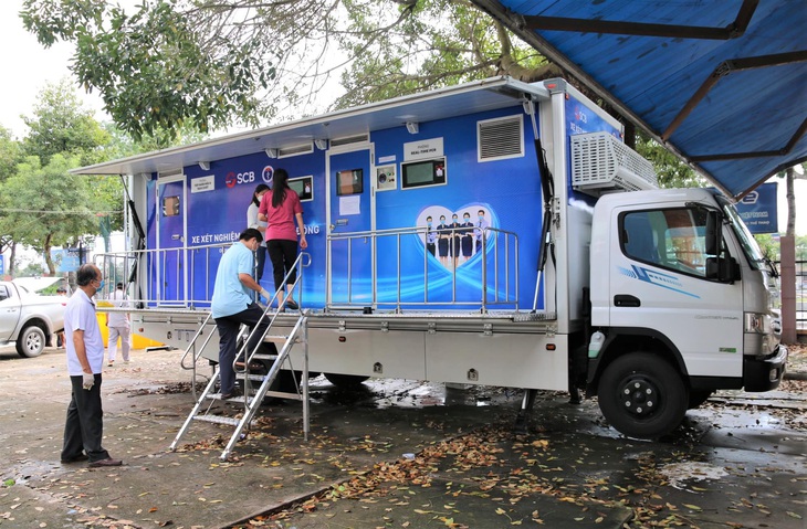 Tiền Giang: Đưa vào hoạt động xe xét nghiệm lưu động tại các điểm nóng - Ảnh 1. Tiền Giang: Đưa vào hoạt động xe xét nghiệm lưu động tại các điểm nóng - Ảnh 1.