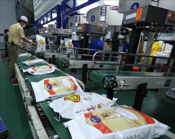 Ngành NH góp phần tháo gỡ khó khăn cho doanh nghiệp lúa gạo bằng giải pháp nào trong dịch COVID-19? - Ảnh 1.