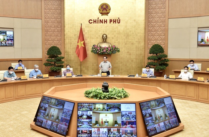 Thống nhất quan điểm chuyển trạng thái từ mục tiêu "không có COVID" sang thích ứng an toàn, linh hoạt - Ảnh 2. Thống nhất quan điểm chuyển trạng thái từ mục tiêu "không có COVID" sang thích ứng an toàn, linh hoạt - Ảnh 2.