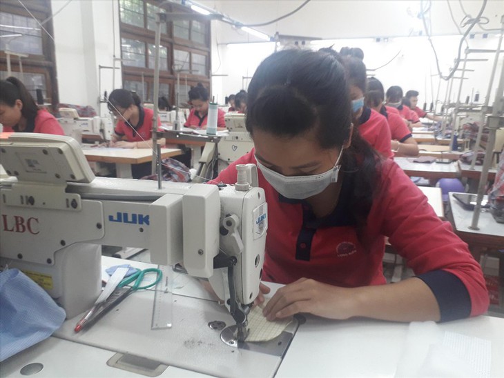 Doanh nghiệp Hà Nội phòng dịch thế nào khi nới lỏng hoạt động? - Ảnh 1. Doanh nghiệp Hà Nội phòng dịch thế nào khi nới lỏng hoạt động? - Ảnh 1.
