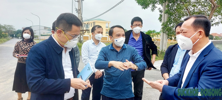 Đảm bảo an toàn phòng dịch khi người dân trở về địa phương đón Tết - Ảnh 3.