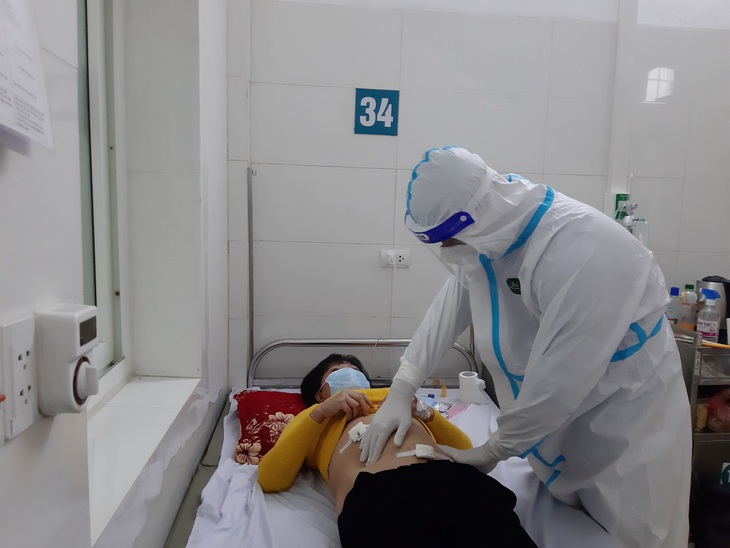 Cứu F0 viêm ruột thừa mủ khi đang điều trị tại nhà - Ảnh 2. Cứu F0 viêm ruột thừa mủ khi đang điều trị tại nhà - Ảnh 2.