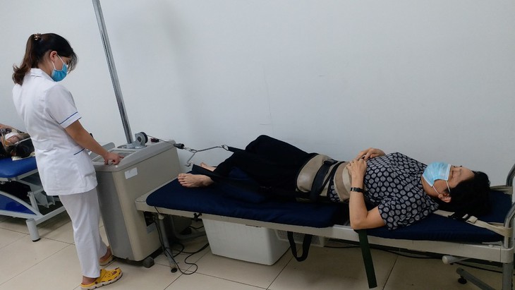 Điều trị bằng máy kéo giãn cột sống trong phục hồi chức năng - Ảnh 3. Điều trị bằng máy kéo giãn cột sống trong phục hồi chức năng - Ảnh 3.