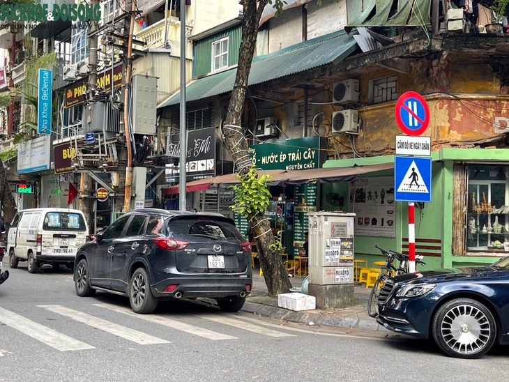 Hà Nội: Tràn lan vi phạm tại phố đỗ xe ngày chẵn, lẻ - Ảnh 6.