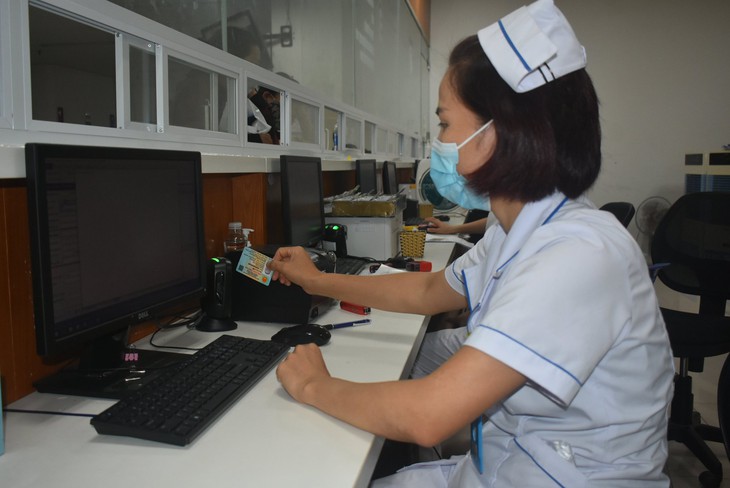 Người dân hưởng lợi từ việc sử dụng CCCD gắn chip và khám chữa bệnh BHYT - Ảnh 2.