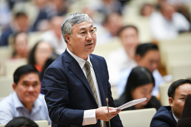 Đại biểu chất vấn tình trạng kẹt xe, ngập úng ở đô thị lớn, Bộ Xây dựng nói… do quy hoạch - Ảnh 2.