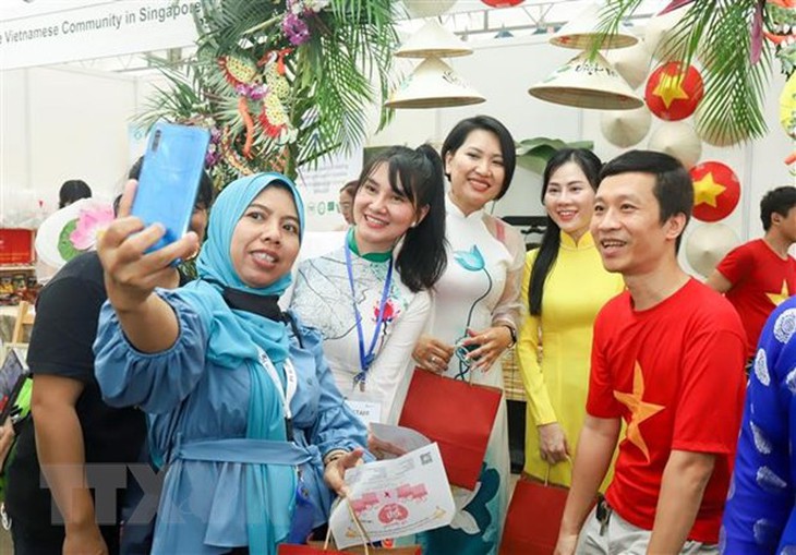 Dấu ấn Việt Nam trong Ngày Quốc tế Người di cư tại Singapore - Ảnh 3. Dấu ấn Việt Nam trong Ngày Quốc tế Người di cư tại Singapore - Ảnh 3.