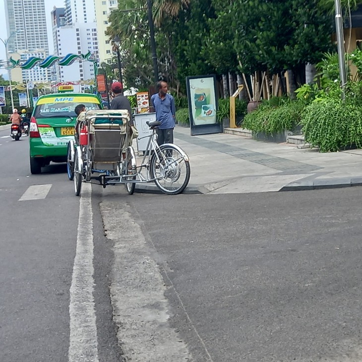 Thăng trầm xích lô trên thành phố biển Nha Trang - Ảnh 6. Thăng trầm xích lô trên thành phố biển Nha Trang - Ảnh 6.