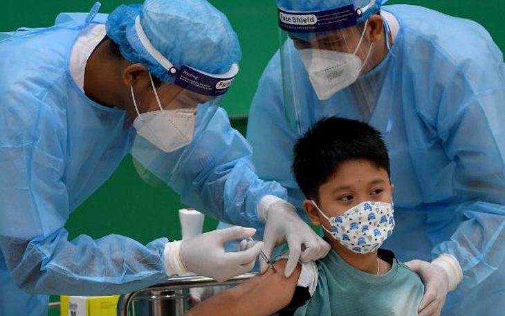 Tiêm vaccine phòng COVID-19 cho trẻ từ 5 - dưới 12 tuổi thế nào? Trẻ từng là F0 có nên tiêm? - Ảnh 1. Tiêm vaccine phòng COVID-19 cho trẻ từ 5 - dưới 12 tuổi thế nào? Trẻ từng là F0 có nên tiêm? - Ảnh 1.