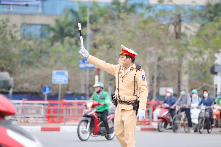 Đoàn thanh niên Công an Hà Nội ra quân bảo đảm an toàn giao thông tại 20 nút trọng điểm đón Sea Games 31 - Ảnh 2. Đoàn thanh niên Công an Hà Nội ra quân bảo đảm an toàn giao thông tại 20 nút trọng điểm đón Sea Games 31 - Ảnh 2.