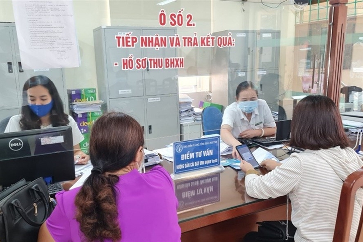 Giải quyết kịp thời, đầy đủ quyền lợi cho người lao động mắc COVID-19 - Ảnh 1.