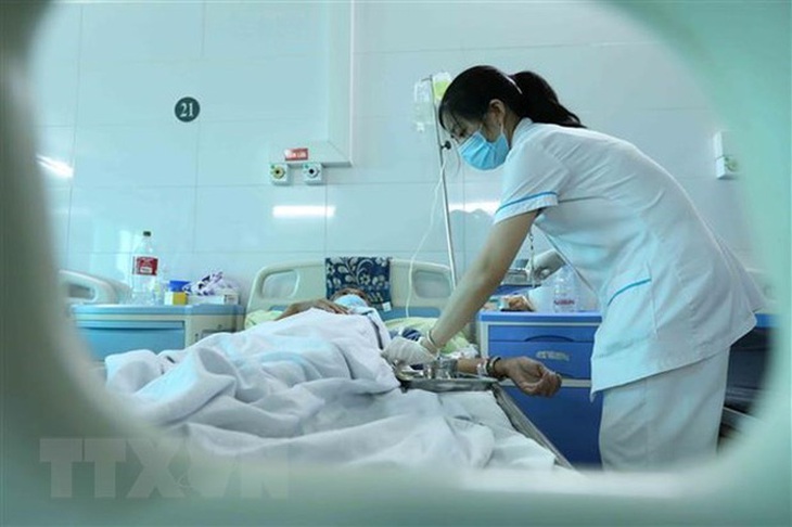 Cẩn trọng mắc sốt xuất huyết khi bị COVID-19 - Ảnh 2.