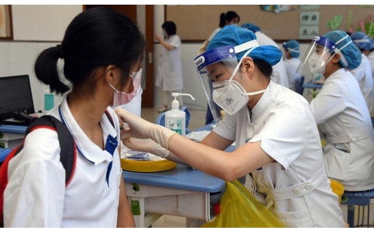 Chuẩn bị và xử trí các phản ứng sau tiêm vaccine phòng COVID-19 cho trẻ 5-12 tuổi - Ảnh 1. Chuẩn bị và xử trí các phản ứng sau tiêm vaccine phòng COVID-19 cho trẻ 5-12 tuổi - Ảnh 1.