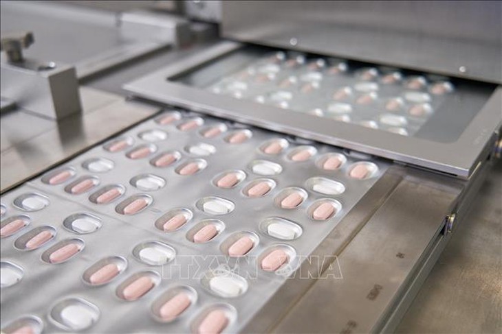 WHO khuyến nghị sử dụng thuốc Paxlovid điều trị bệnh nhân COVID-19 thể nhẹ có nguy cơ nhập viện - Ảnh 1. WHO khuyến nghị sử dụng thuốc Paxlovid điều trị bệnh nhân COVID-19 thể nhẹ có nguy cơ nhập viện - Ảnh 1.