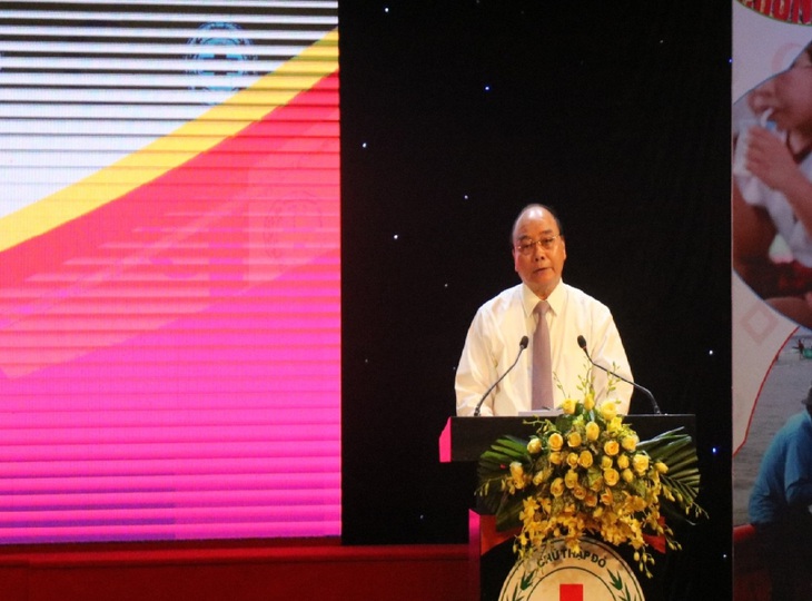 Chủ tịch nước Nguyễn Xuân Phúc dự Lễ phát động Tháng Nhân đạo quốc gia năm 2022 - Ảnh 1. Chủ tịch nước Nguyễn Xuân Phúc dự Lễ phát động Tháng Nhân đạo quốc gia năm 2022 - Ảnh 1.