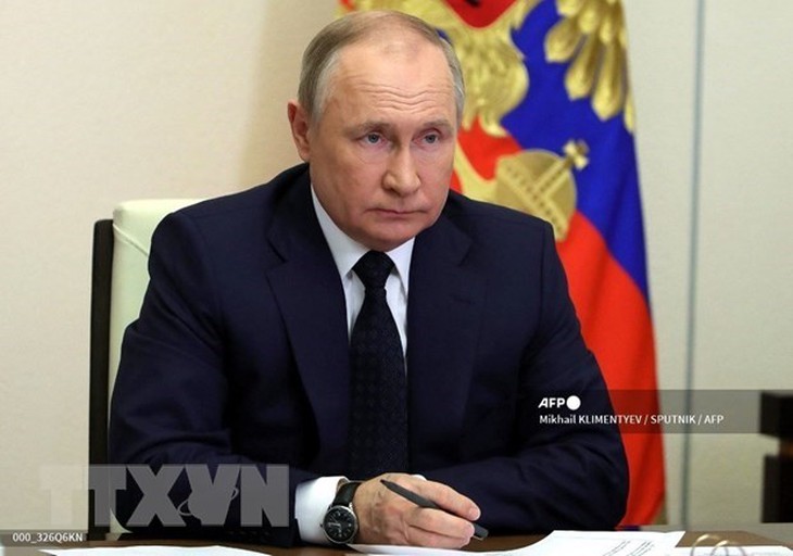 Tổng thống Nga tuyên bố đáp trả mọi hành động can thiệp từ bên ngoài vào Ukraine - Ảnh 1. Tổng thống Nga tuyên bố đáp trả mọi hành động can thiệp từ bên ngoài vào Ukraine - Ảnh 1.