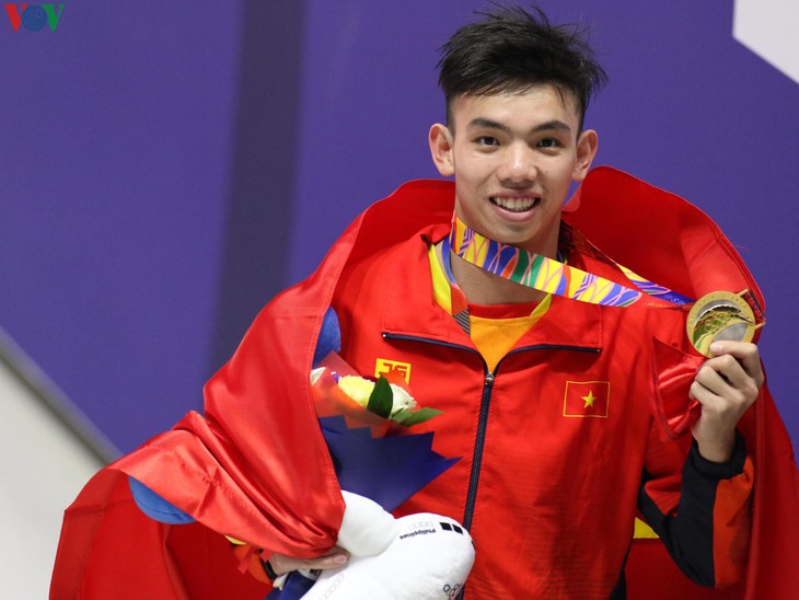 Người được lựa chọn cầm cờ tại Lễ khai mạc SEA Games 31 là 'kình ngư' Huy Hoàng - Ảnh 2. Người được lựa chọn cầm cờ tại Lễ khai mạc SEA Games 31 là 'kình ngư' Huy Hoàng - Ảnh 2.