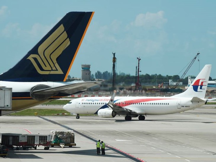 Malaysia khai thác chuyến bay chở khách đầu tiên dùng nhiên liệu xanh - Ảnh 1.