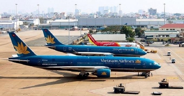 Giá vé máy bay lại tăng 'nóng' - Ảnh 2.