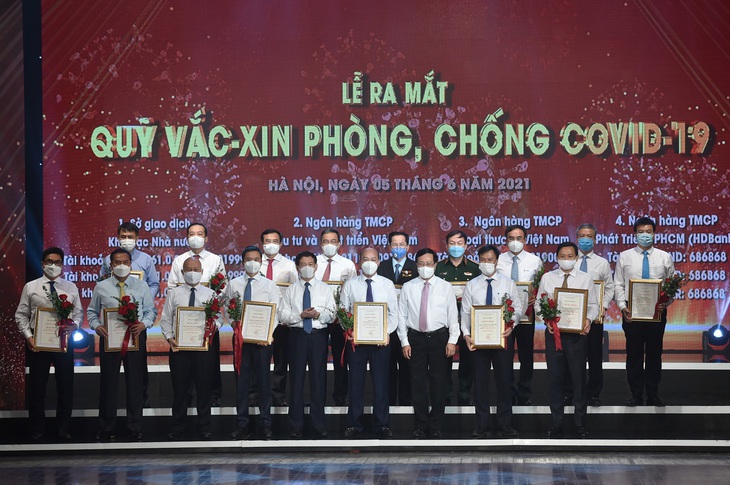 Tháo gỡ khó khăn, vướng mắc xếp loại đối với DNNN tham gia đóng góp, ủng hộ phòng, chống dịch COVID-19 - Ảnh 2. Tháo gỡ khó khăn, vướng mắc xếp loại đối với DNNN tham gia đóng góp, ủng hộ phòng, chống dịch COVID-19 - Ảnh 2.