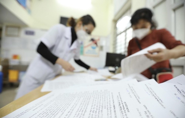 Hướng dẫn thủ tục giải quyết BHXH cho người mắc COVID-19 đảm bảo chặt chẽ, không để trục lợi - Ảnh 2. Hướng dẫn thủ tục giải quyết BHXH cho người mắc COVID-19 đảm bảo chặt chẽ, không để trục lợi - Ảnh 2.
