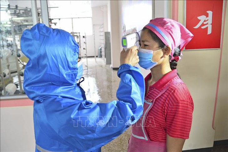 Triều Tiên tuyên bố chiến thắng dịch COVID-19 - Ảnh 1.