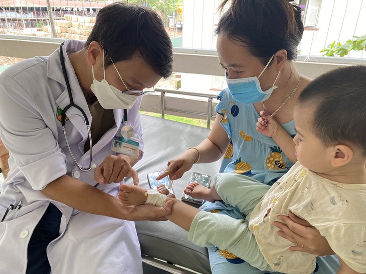 TP.HCM: Nguy cơ bùng phát bệnh tay chân miệng trong thời gian tới - Ảnh 1. TP.HCM: Nguy cơ bùng phát bệnh tay chân miệng trong thời gian tới - Ảnh 1.