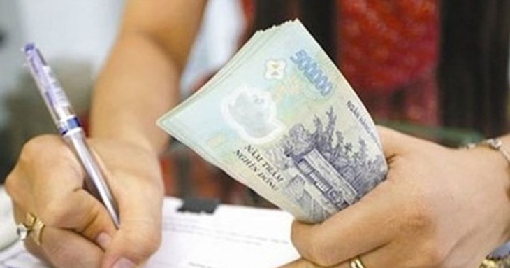 Chính phủ yêu cầu thanh toán đầy đủ tiền lương, tiền thưởng cuối năm cho người lao động - Ảnh 1.