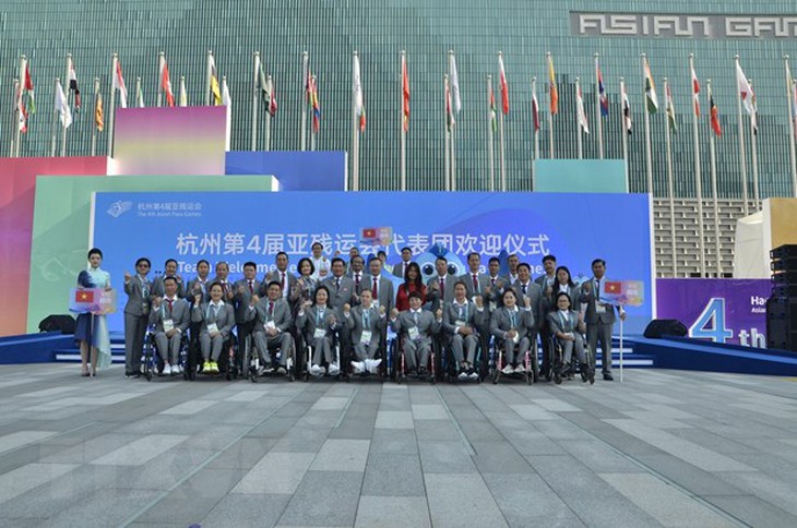 Asian Para Games: VĐV Khuyết tật Việt Nam nỗ lực vượt lên chính mình - Ảnh 1. Asian Para Games: VĐV Khuyết tật Việt Nam nỗ lực vượt lên chính mình - Ảnh 1.