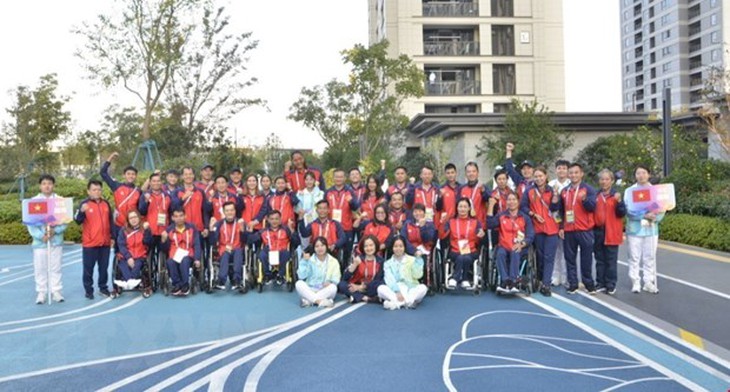 Asian Para Games: Đoàn Thể thao Người Khuyết tật Việt Nam về nước - Ảnh 1. Asian Para Games: Đoàn Thể thao Người Khuyết tật Việt Nam về nước - Ảnh 1.