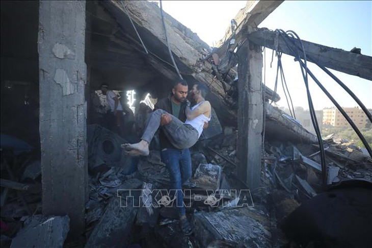 Hamas xác nhận thời điểm thực thi thỏa thuận ngừng bắn tạm thời- Ảnh 1. Hamas xác nhận thời điểm thực thi thỏa thuận ngừng bắn tạm thời- Ảnh 1.