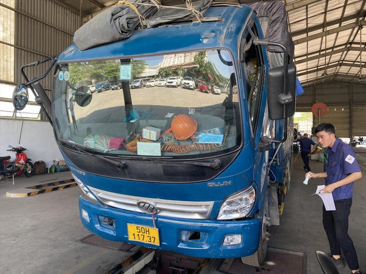 Cảnh báo thủ đoạn lừa đảo gia hạn đăng kiểm ô tô ở TPHCM- Ảnh 1.