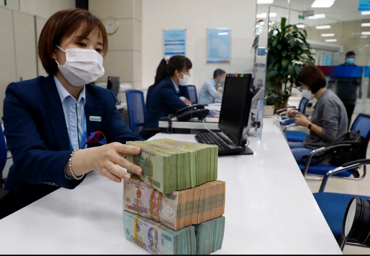 Lãi suất liên ngân hàng bất ngờ ‘dậy sóng’ những ngày cuối năm- Ảnh 1.