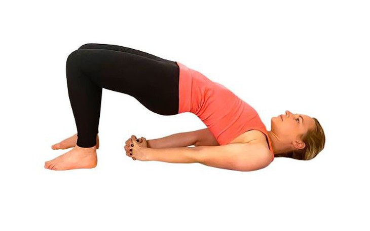 7 bài tập yoga làm giảm khó tiêu, đầy bụng - Ảnh 3. 7 bài tập yoga làm giảm khó tiêu, đầy bụng - Ảnh 3.
