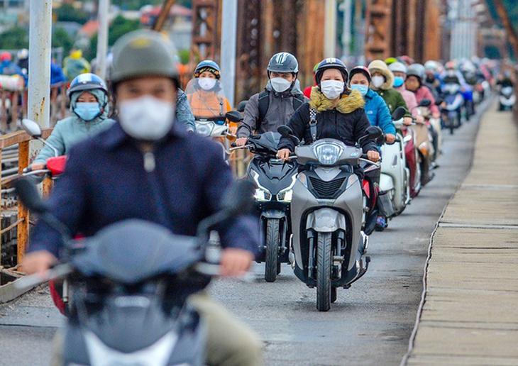 Thời tiết hôm nay (18/3): Bắc Bộ có mưa phùn; Nam Bộ nắng gắt - Ảnh 1.