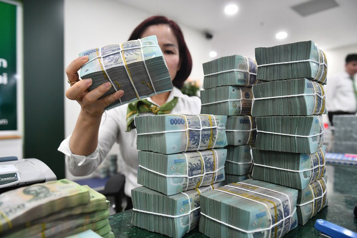 Giảm các mức lãi suất điều hành từ ngày 3/4/2023 - Ảnh 2.