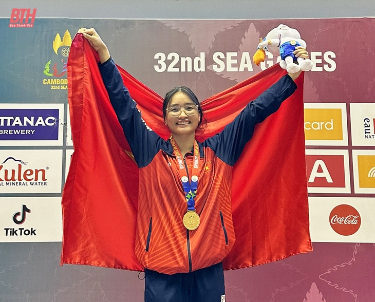 Nghi lực phi thường của cô gái Mường giành 3 HCV, phá 2 kỷ lục SEA Games 32 - Ảnh 1.