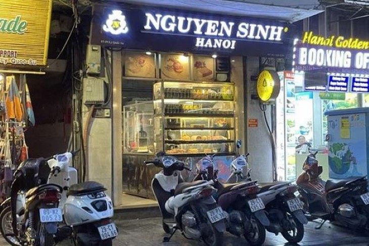 Hành hung khách hàng, 2 nhân viên quán Nguyên Sinh bị xử phạt 13 triệu đồng - Ảnh 2.