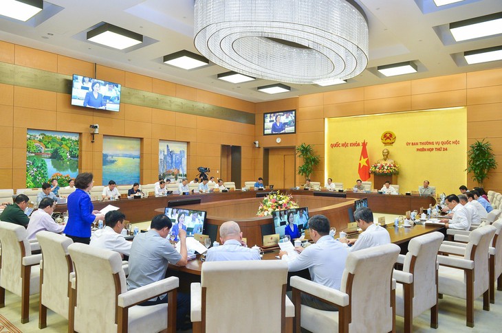 UBTVQH xem xét thông qua dự thảo Nghị quyết sắp xếp các đơn vị hành chính cấp huyện, xã - Ảnh 1. UBTVQH xem xét thông qua dự thảo Nghị quyết sắp xếp các đơn vị hành chính cấp huyện, xã - Ảnh 1.