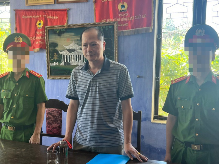 Bắt 2 Phó giám đốc Trung tâm đăng kiểm tại Quảng Bình - Ảnh 1.