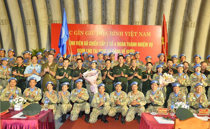 Hình ảnh Lễ đón Đoàn Bệnh viện Dã chiến 2.4 trở về từ Nam Sudan - Ảnh 10.