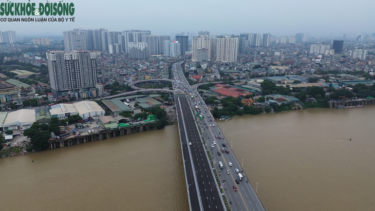 Người dân tranh thủ tập thể dục, "trải nghiệm trước" cầu Vĩnh Tuy 2 - Ảnh 19.