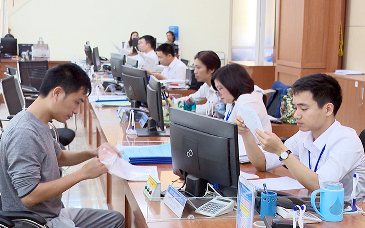 Phó Thủ tướng Trần Lưu Quang: Nhiều nơi vẫn giữ thói quen làm việc thủ công, không chịu cải cách - Ảnh 1. Phó Thủ tướng Trần Lưu Quang: Nhiều nơi vẫn giữ thói quen làm việc thủ công, không chịu cải cách - Ảnh 1.