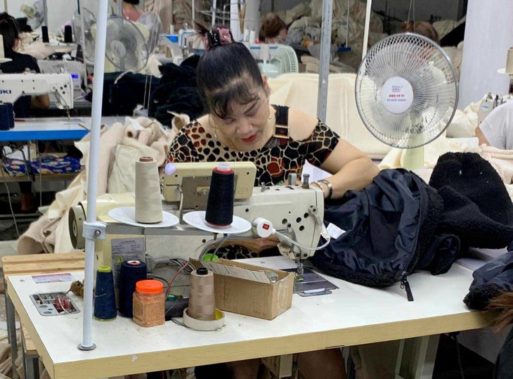 Người lao động thấp thỏm ngóng chờ thưởng Tết- Ảnh 1.