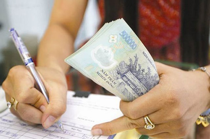 Ép người lao động trực Tết có thể bị xử phạt đến 50 triệu đồng- Ảnh 1.