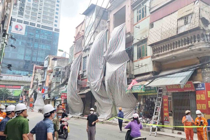 2 hộ dân không đồng thuận, quận Thanh Xuân thực hiện cưỡng chế mở rộng đường Nguyễn Tuân- Ảnh 1.