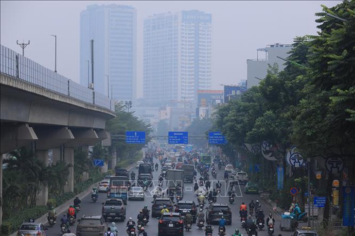 Chất lượng không khí tại một số điểm của Hà Nội ở mức xấu- Ảnh 1.