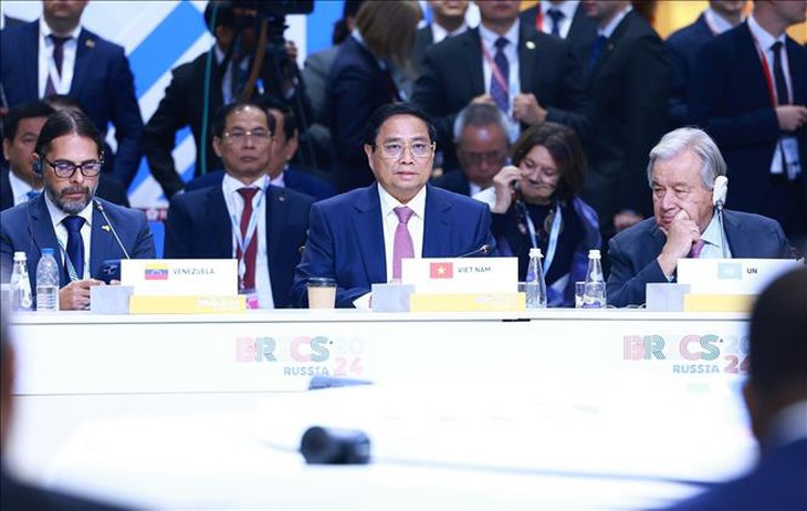 Thủ tướng Phạm Minh Chính phát biểu tại Hội nghị các nhà lãnh đạo BRICS mở rộng- Ảnh 1. Thủ tướng Phạm Minh Chính phát biểu tại Hội nghị các nhà lãnh đạo BRICS mở rộng- Ảnh 1.