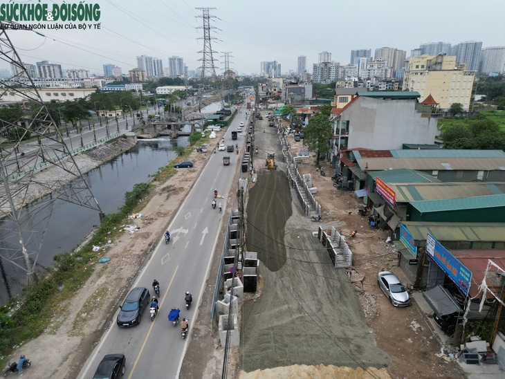'Soi' tiến độ thi công mở rộng đường Tam Trinh- Ảnh 1.