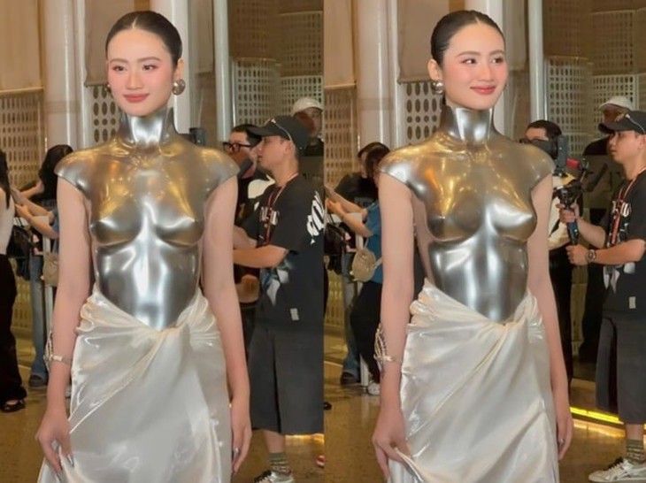 Vừa trở về nước, Hoa hậu Ý Nhi tiếp tục gây tranh cãi- Ảnh 1. Vừa trở về nước, Hoa hậu Ý Nhi tiếp tục gây tranh cãi- Ảnh 1.